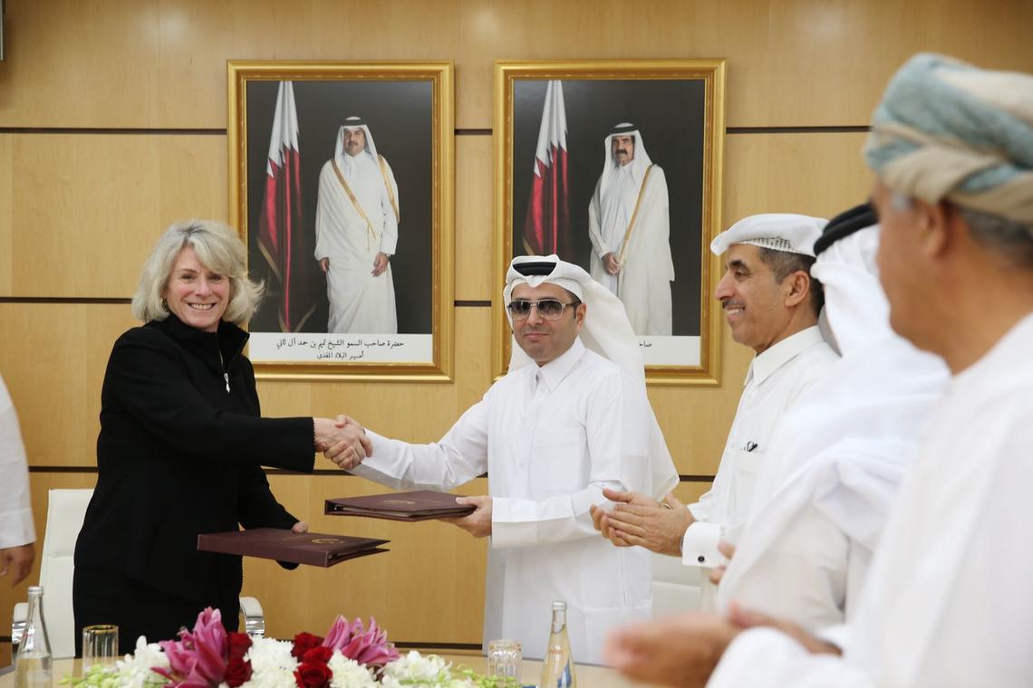 University of Calgary President Elizabeth Cannon and Qatari Minister of Education, His Excellency Mohammed bin Abdul Wahid Al-Hammadi, shake hands to help usher in a new collaboration agreement between Qatar's Ministry of Education and Higher Education and the university.