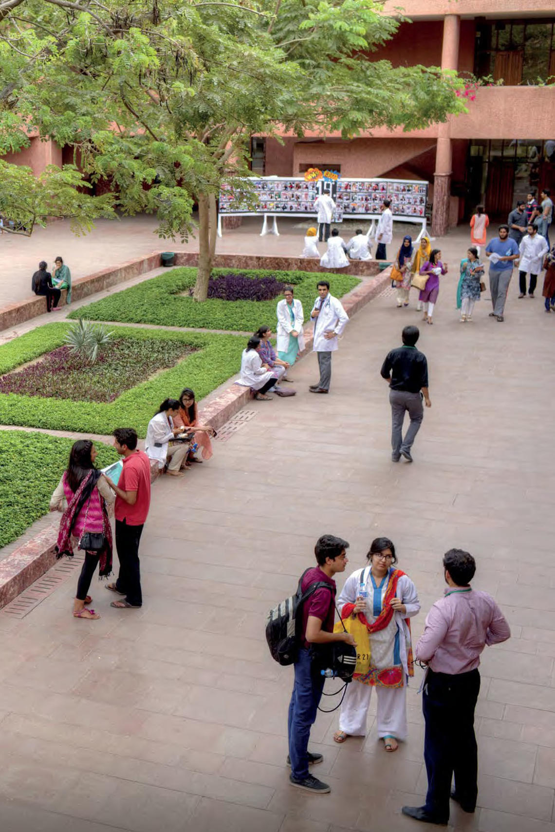 At Aga Khan University’s Stadium Road campus in Karachi, students gather in the courtyard of the Medical College between classes and rounds at the Aga Khan University Hospital.