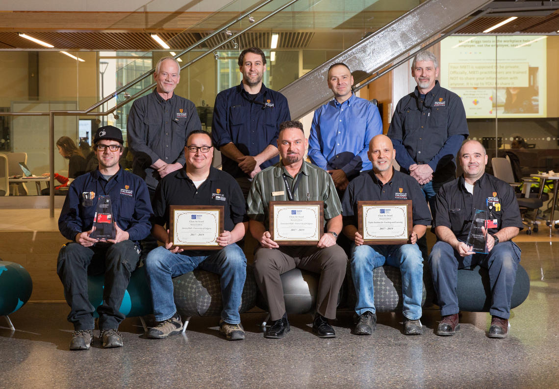 The facilities operations and maintenance team at the University of Calgary. Front row, from left: Stephen Zelmer, Ken Brewer, Robb Nesbitt, Rob Schultz, and Travis Simington. Back row, from left: Kent Fowler, Graham McPhee, Shane Hubl, and Dale Wollbaum. Photo by Riley Brandt, University of Calgary
