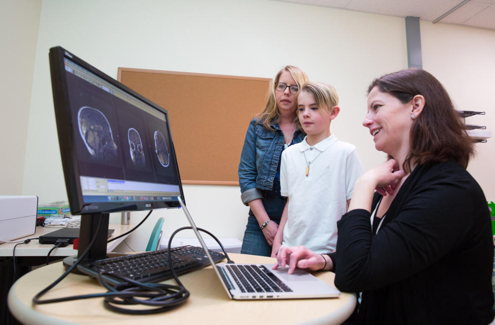 Heather Oosterhuis enrolled her son Mason Corson, age 10, in a study led by Ashley Harris at the University of Calgary to better understand the cause of paediatric migraines.