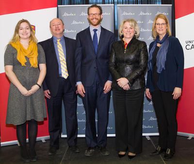 Taking part in the announcement with Minister Marlin Schmidt, centre, were (from left) Social Work master's student Dana Swystun, Faculty of Social Work Dean Jackie Sieppert, President Elizabeth Cannon, and Faculty of Nursing Dean Dianne Tapp.