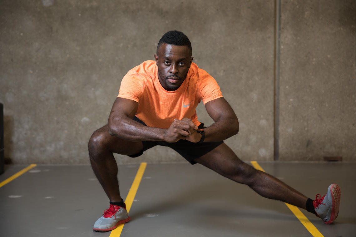 Sam Effah demionstrating Dynamic Stretching