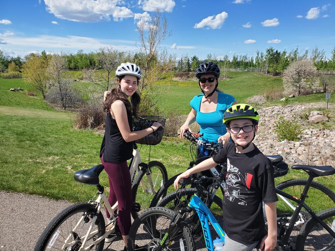 Nicole with her kids out for a bike ride. Biking is an important part of Nicole's routine. 