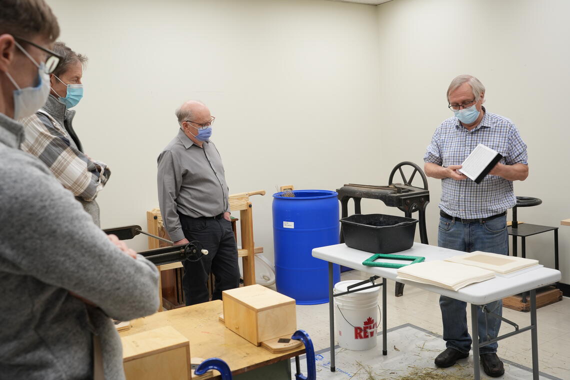 Brian Queen creating paper