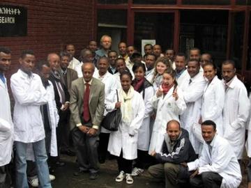 Dr. Gedamu and students in Ethiopia