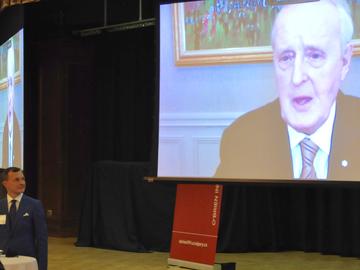 Tom Stelfox, scientific director of the O’Brien Institute for Public Health, listens as former Prime Minister Brian Mulroney answers a question during a virtual conversation on Monday, Nov. 29.