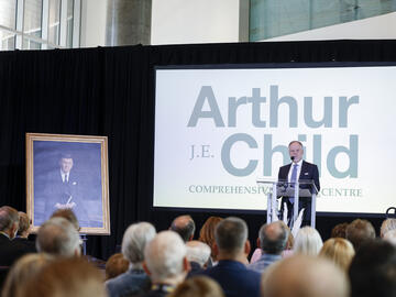 Lorne Jacobson speaks on behalf of the Arthur J.E. Child Foundation at the gift and naming announcement.