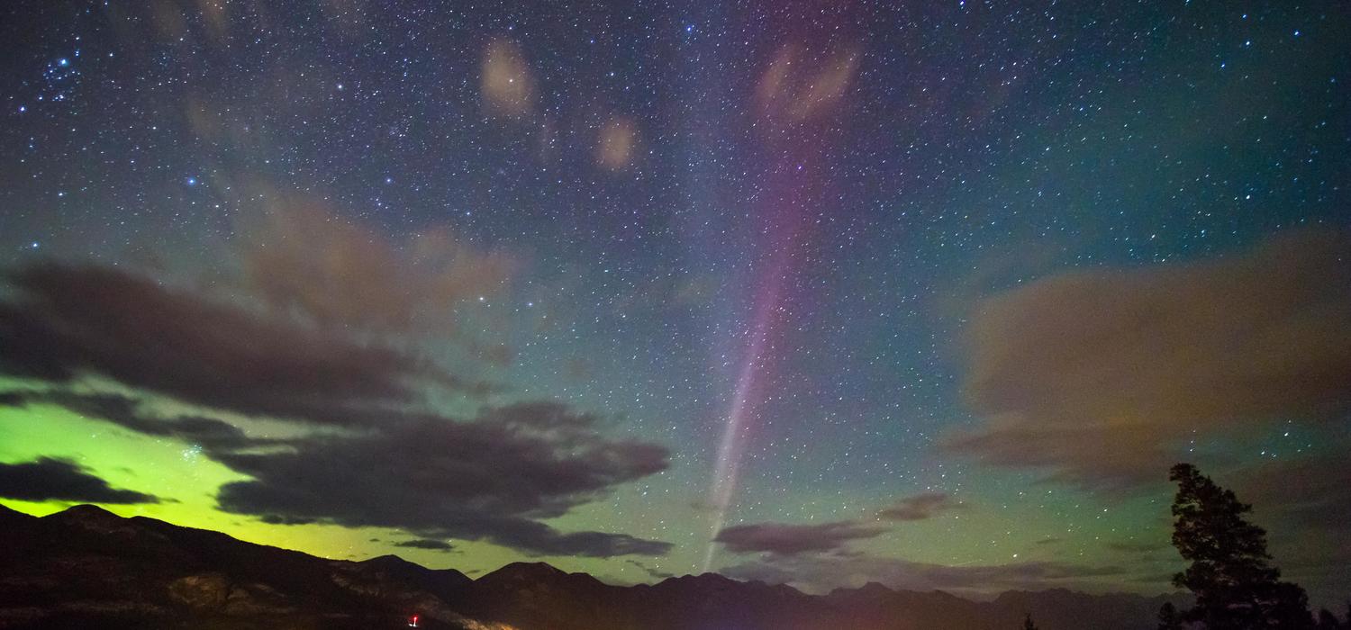 STEVE appears in the sky over Invermere, B.C. This photo prompted the conversation that led to the start of scientific investigation into STEVE. Photo by Neil Zeller, Neil Zeller Photography