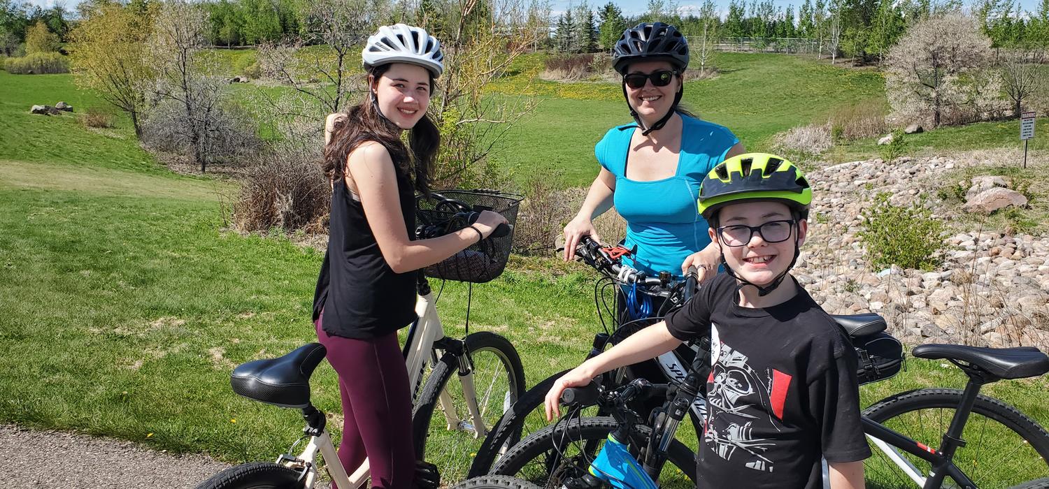 Nicole with her kids out for a bike ride. Biking is an important part of Nicole's routine. 