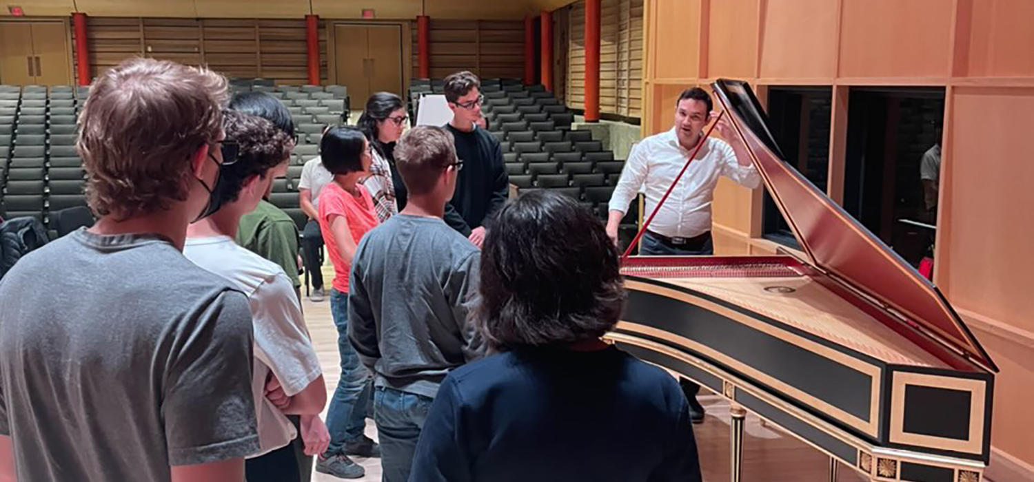 Justin Luchinski demos the harpsichord to students in the piano studio class, Sep. 2022