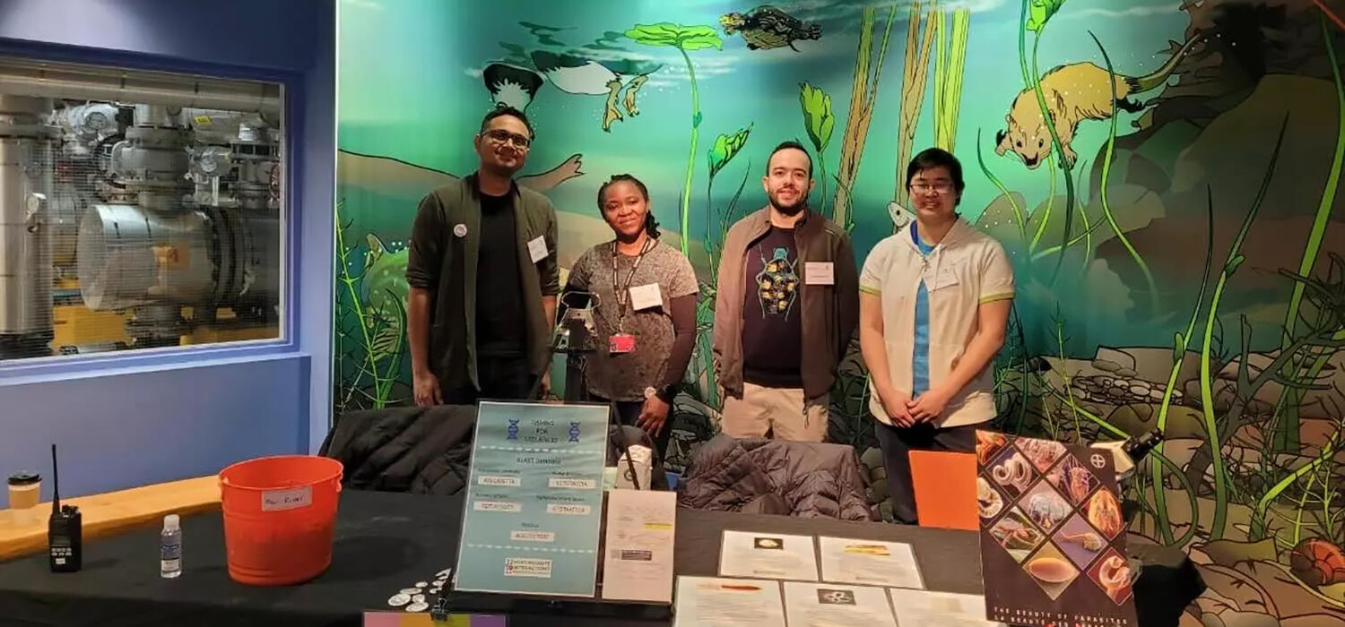 From left to right: Viraj Muthye, Grace Ochigbo, Sina Mohtasebi and Ty Pan host a booth at Bow Habitat Station's annual Fishtival event