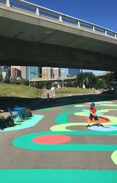 The “whimsical walk,” designed in collaboration with University of Calgary students, invites pedestrian participation through creative play opportunities.