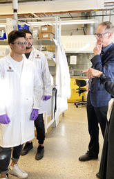 Chancellor Deborah Yedlin in the lab with chemical engineering students.