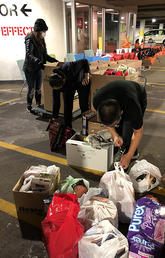 LSE student staff sort and organize community food donations 