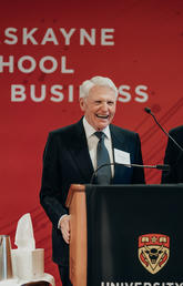 Alumnus Rob Peters, co-founder of Peters & Co. Limited, and his son Brennan Peters.