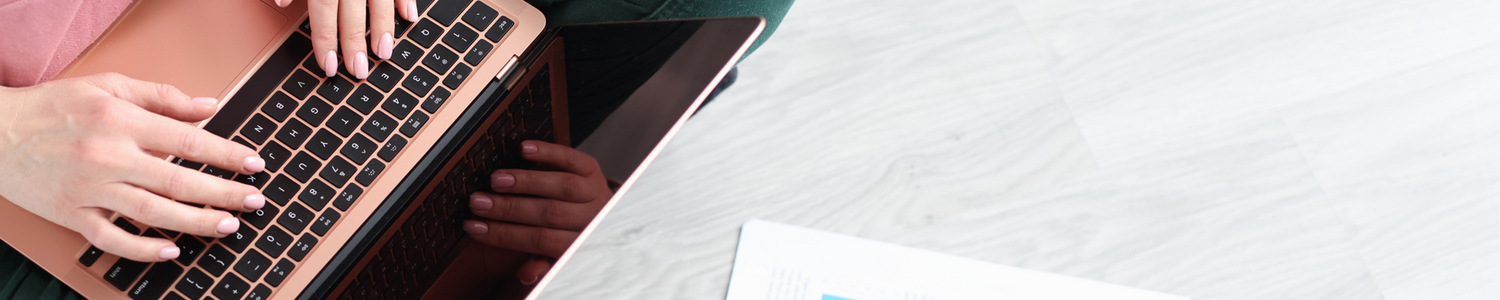 Woman typing on laptop