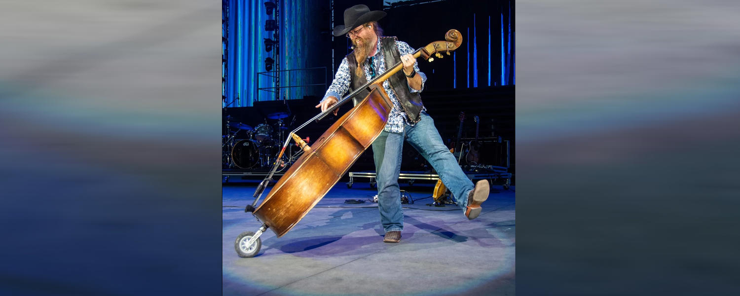 Jason Valleau performs on stage