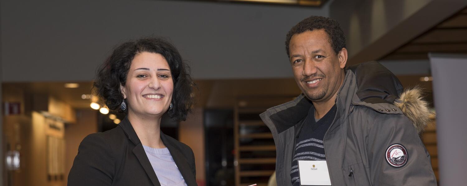 Two people smiling
