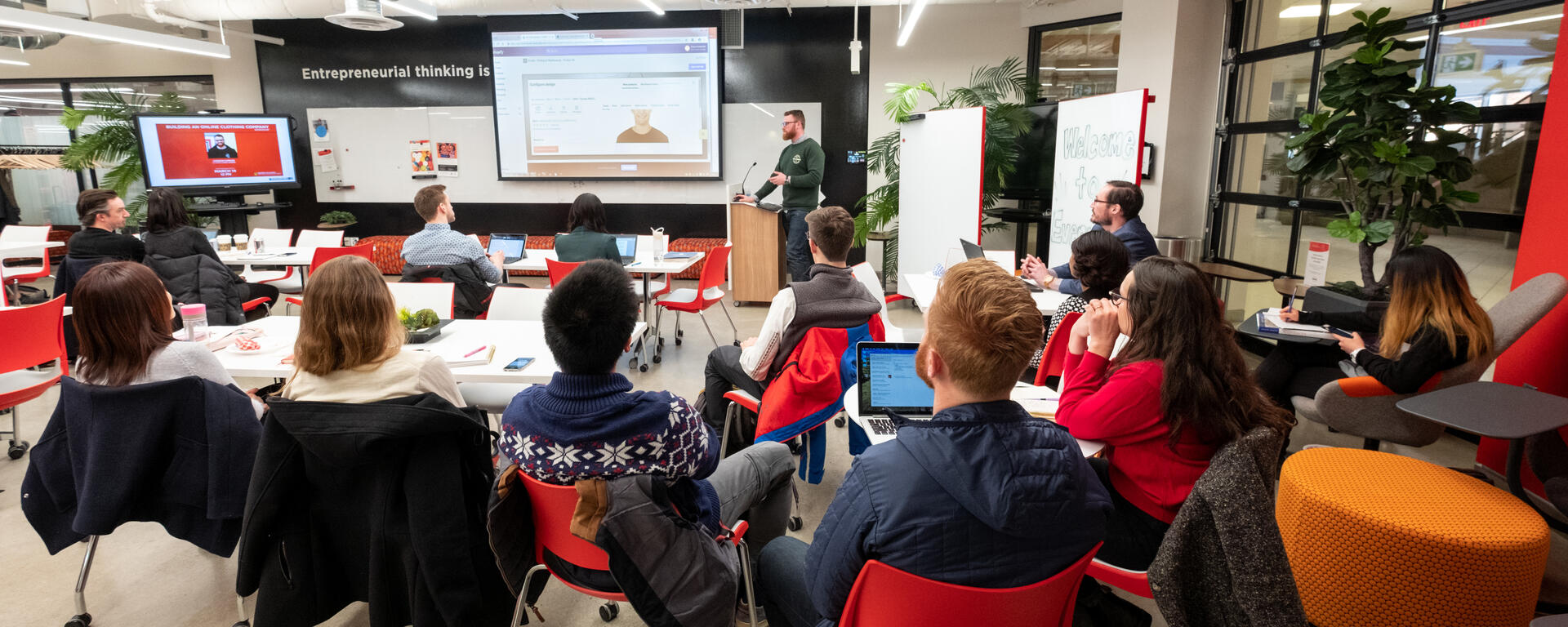 Instructor at front of class.