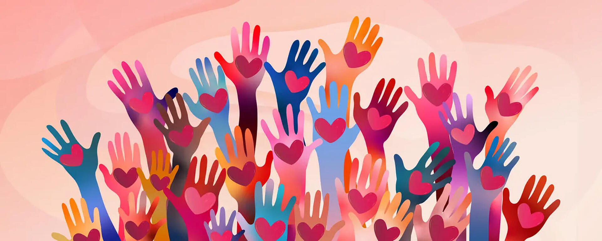 Raised hands of volunteer people holding a heart.