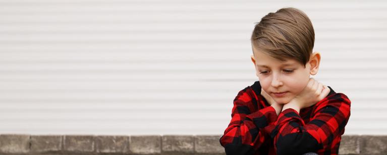 Photo of boy looking sad