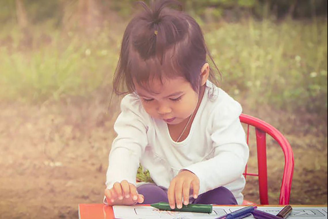 Child with crayon