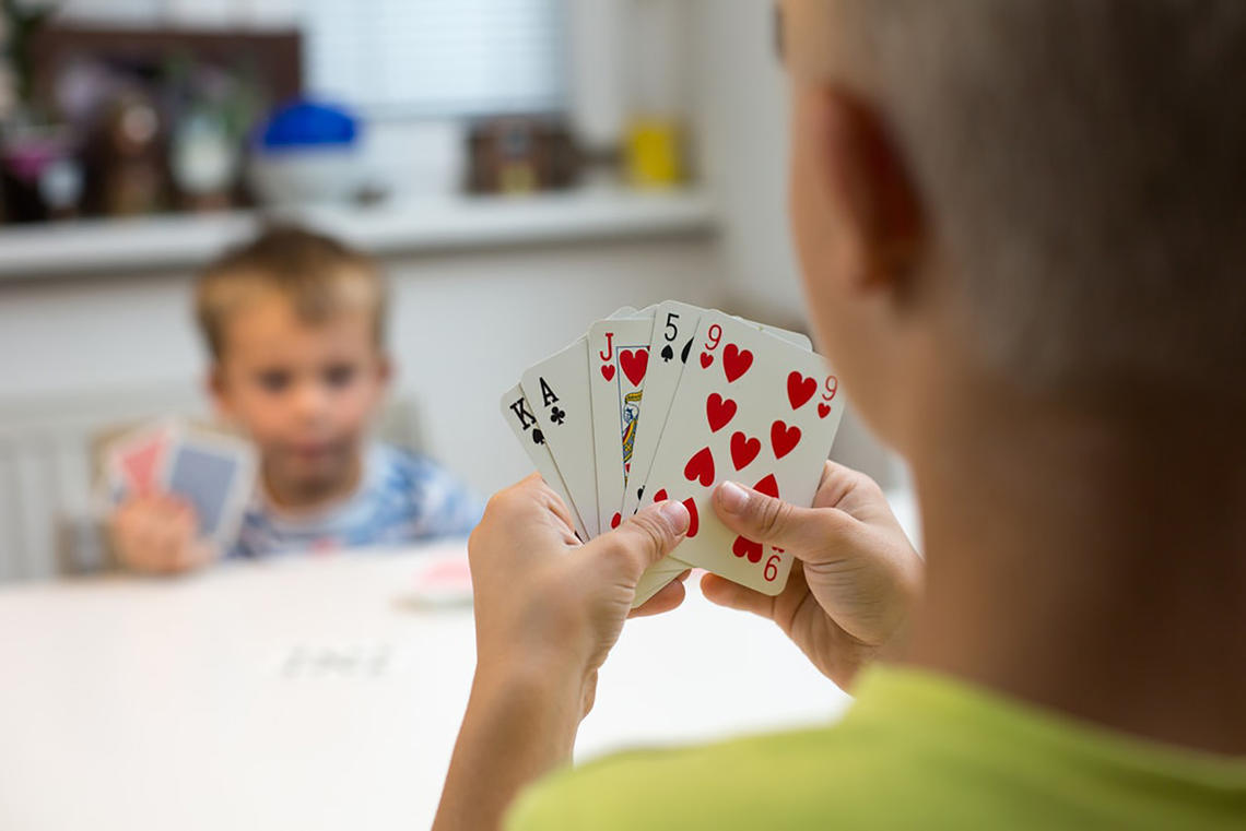 Kids playing cards