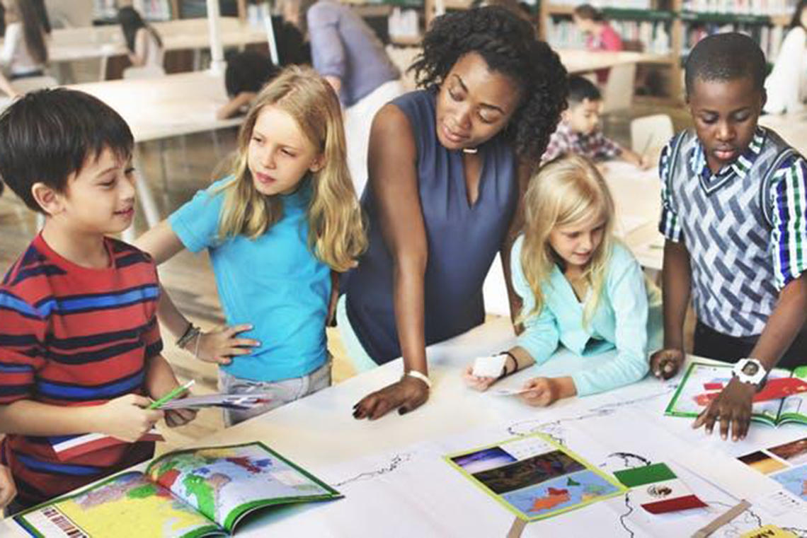 Teacher with students