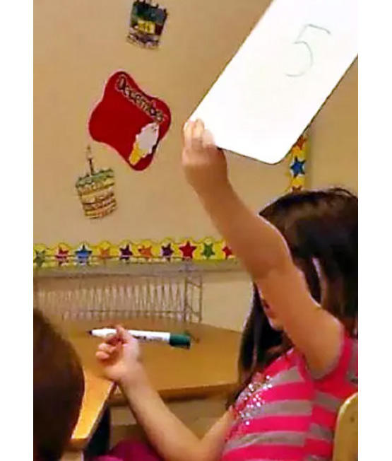 Child with score card