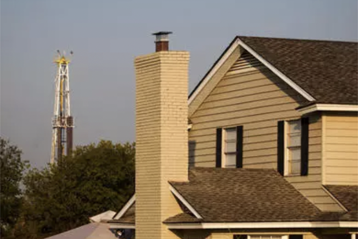 House with tower nearby